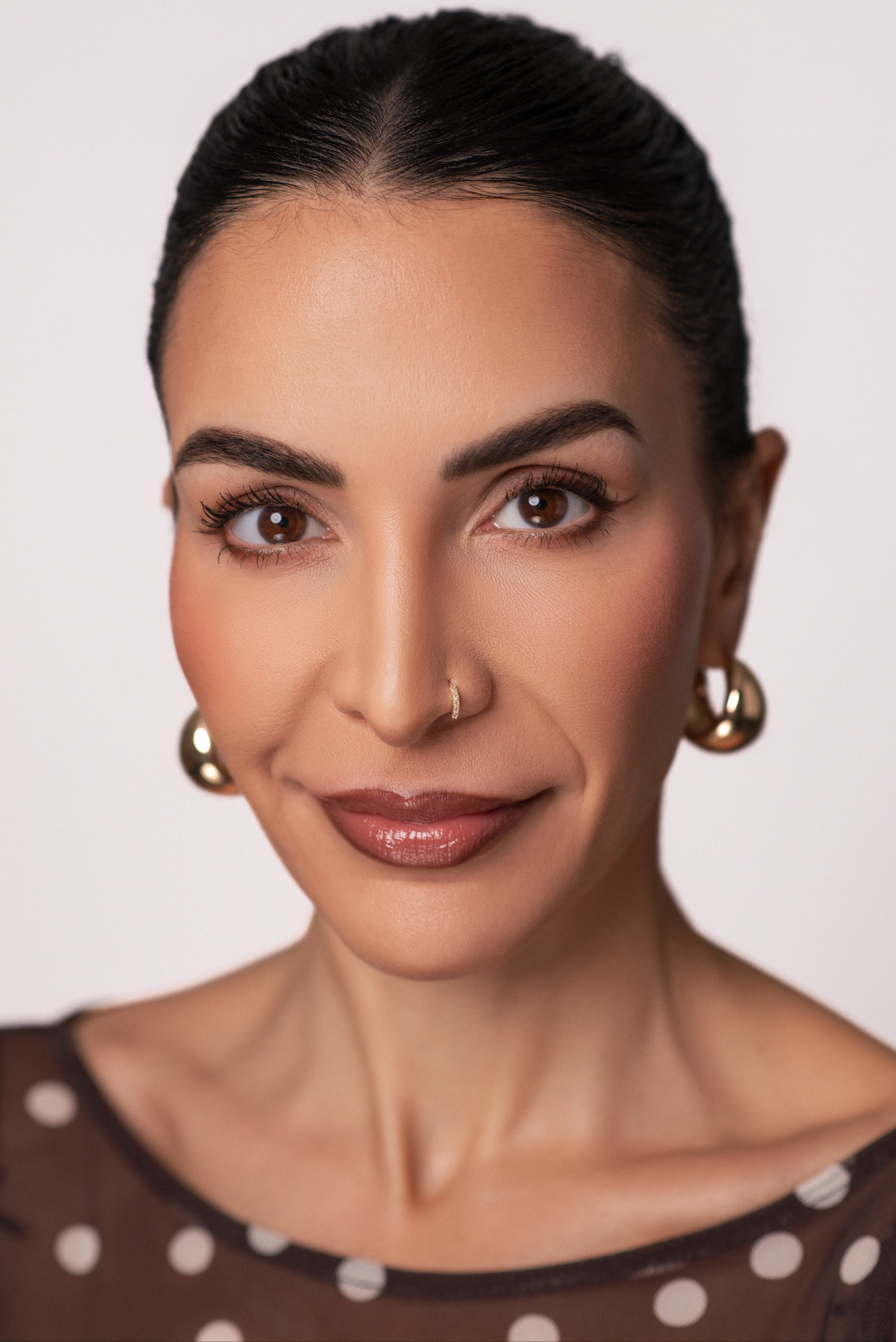 Gabi wearing the chocolate brown eyeliner.