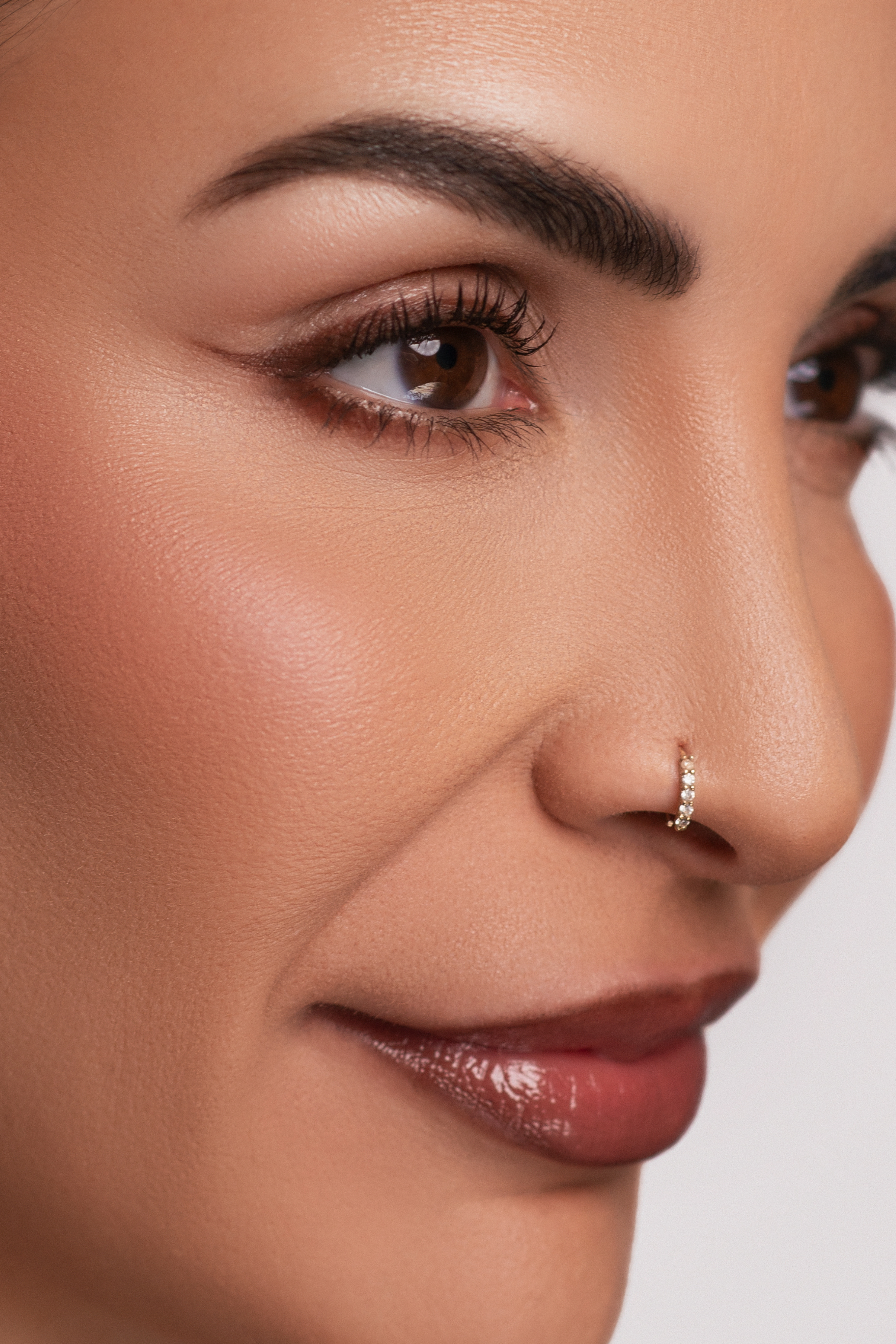 Glam Girl Gabi close up of face wearing Chocolate Brown Eyeliner.