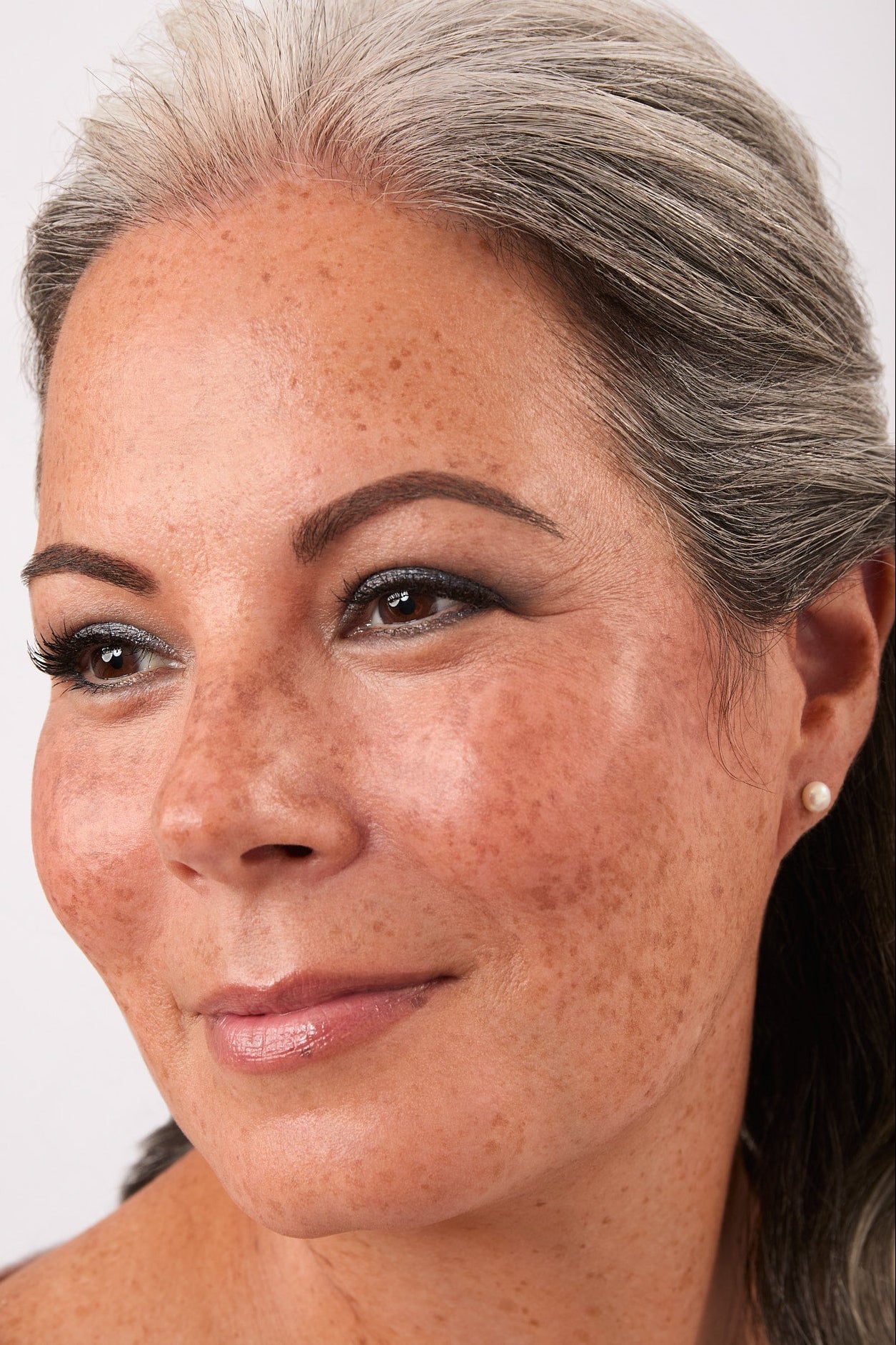 Woman's face with Steel Gray Eyeliner Applied.