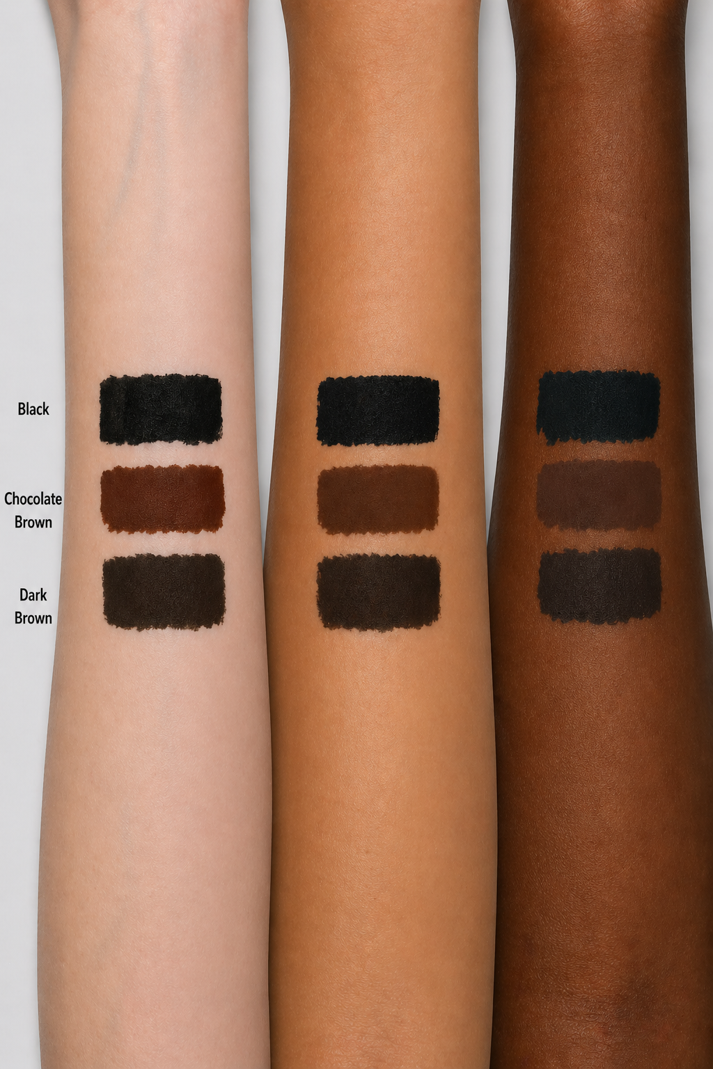 Swatches of black, chocolate brown, and dark brown eyeliner  on 3 different skin tones.